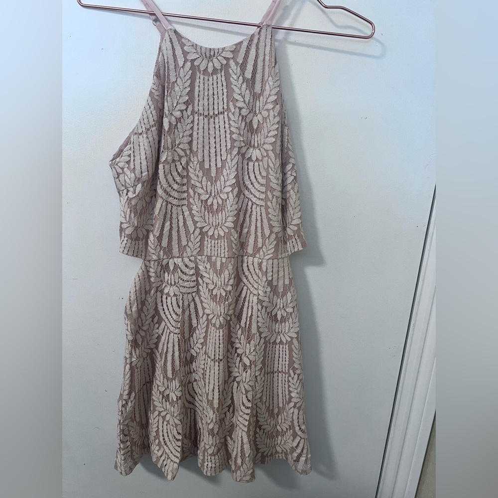 Lulu’s lace lined dress size small with side cutouts